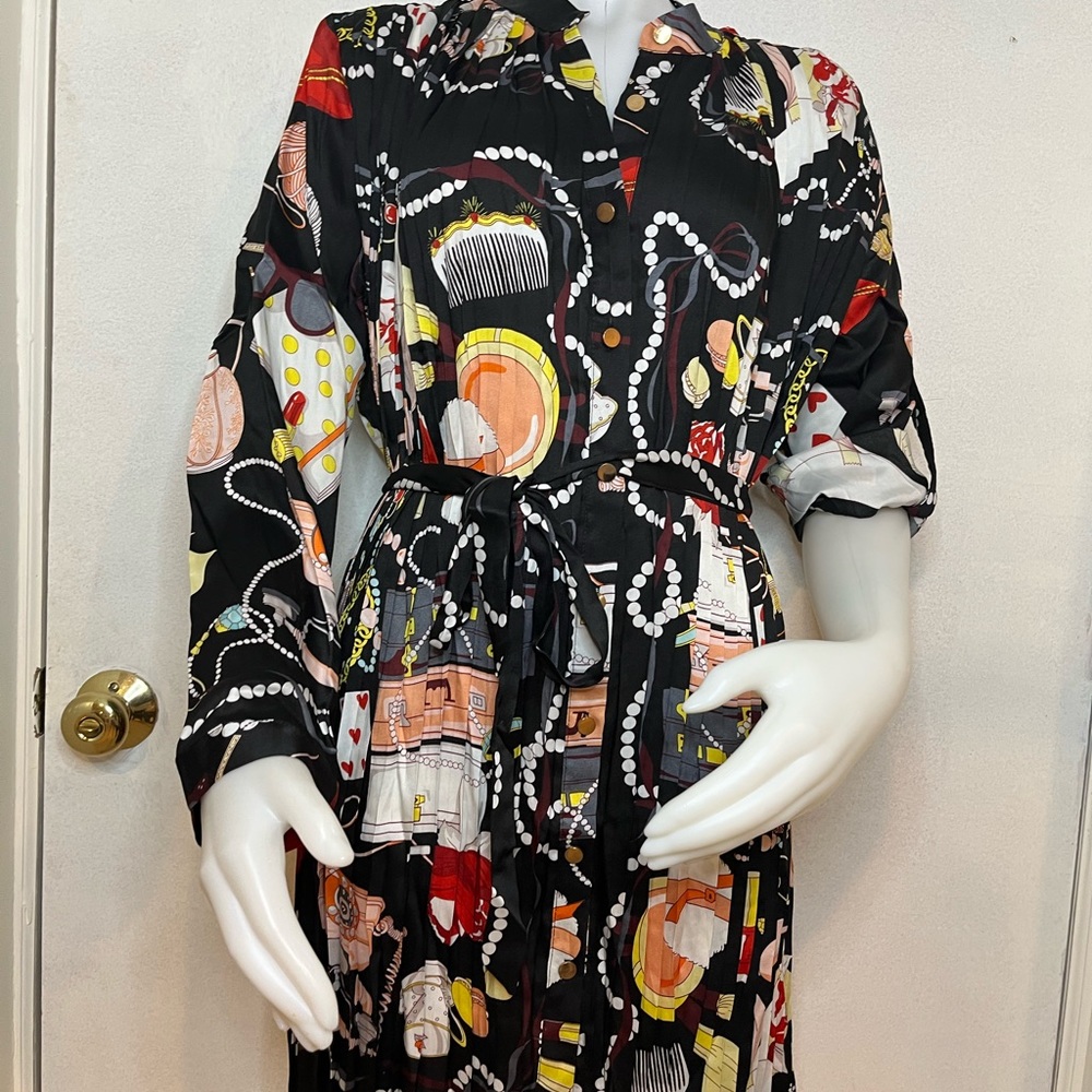 Colorful ladies top. NWT comes in various sizes